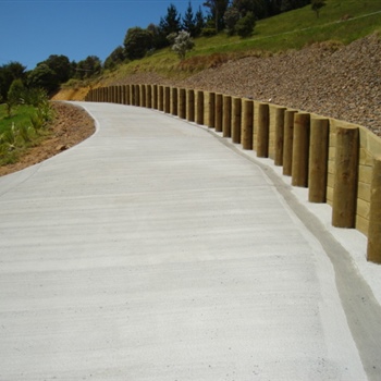 Concrete driveway timber retaining wall