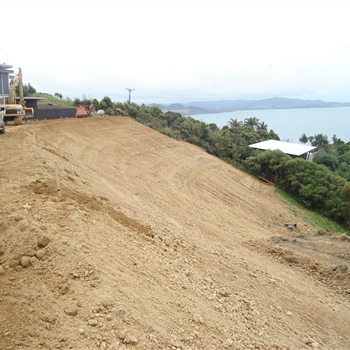 Earthwall with soilder piling at bottom to gain more lawn at Matapouri Heights Tutukaka Coast