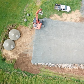 House site excavation volcanic paddock stone retaining wall